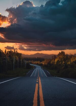 Sunset Road: A Journey to the Horizon - Premium Wooden Framed Poster. Ready to Hang.